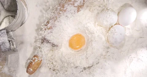 Slow motion cooking with eggs and flour Video stock 344986315