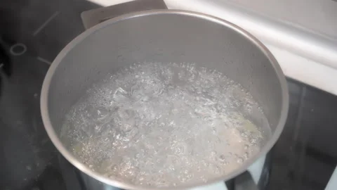 Slow motion of cooking pot with boiling water Video stock 252489554