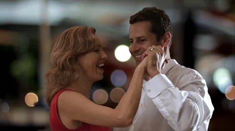 Slow motion of a couple dancing in town. Stock Footage 43681056