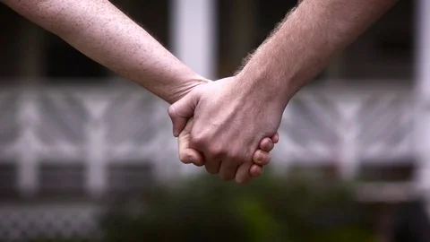 Slow Motion Couple Holding Hands Stock Footage 78884615
