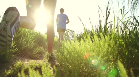 Slow Motion Couple Running At Sunset, HD Stock Footage 51470170