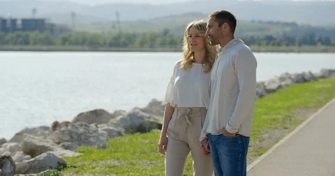 Slow Motion Of Couple Talking About Beautiful Ocean View Stock Footage 123733783