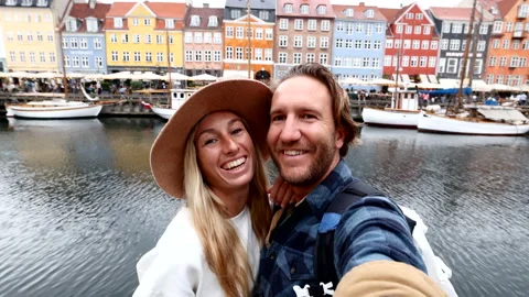 Slow motion: Couple tourist taking selfies in Copenhagen, Denmark Stock Footage 219837653