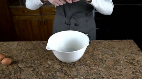 Slow motion cracking eggs Stock Footage 150278225