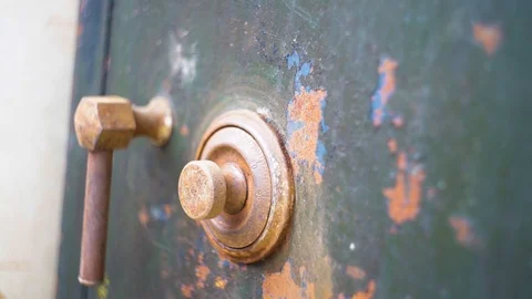 [Slow Motion] Cracking an Old Safe Stock Footage 125610694