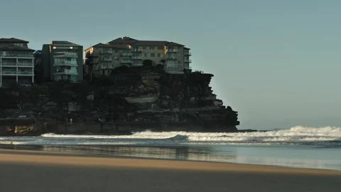 Slow motion crashing waves and Queenscliff properties in Sydney 4K Stock Footage 292375982