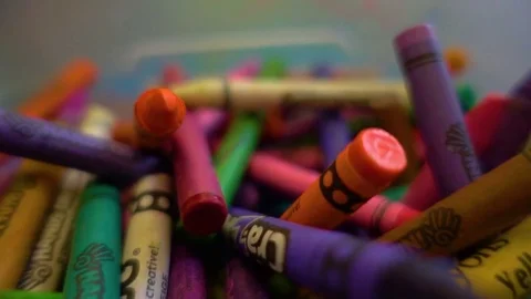 SLOW MOTION CRAYON PILE DOLLY SHOT BRIGHT COLORS Stock Footage 84291492