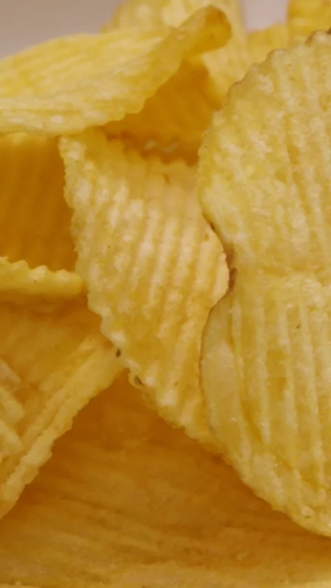 Slow Motion Crisps Falling into Bowl - Vertical Format Stock Footage 328212205