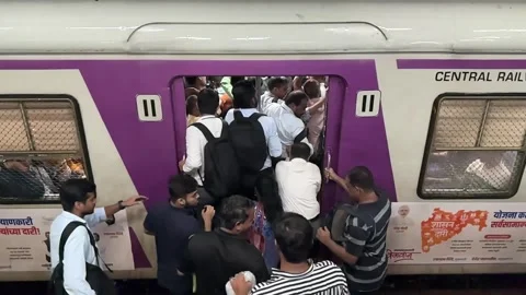 Slow Motion Crowd on Local Train. Mumbai. 4K Stock Footage 253255216