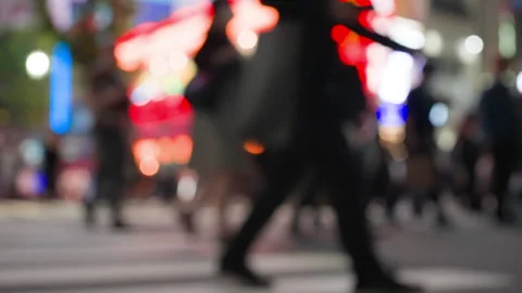 Slow motion crowd of people crossing street at japan. City nightlife touris.. Stock Footage 243326476