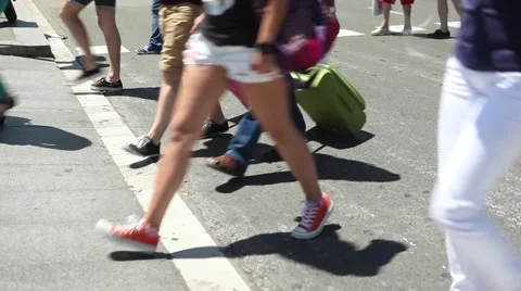 Slow Motion crowd of People walking at busy city street intersection Video stock 40550006
