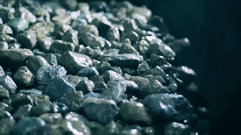 Slow motion of crushed minerals falling from the conveyor Stock Footage 150479008