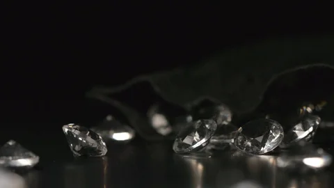SLOW MOTION: Crystals fall out from a black sac Video stock 71451544