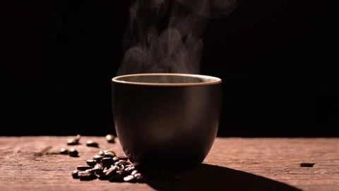 Slow motion of cup of coffee sits on a wooden surface Stock Footage 295086811