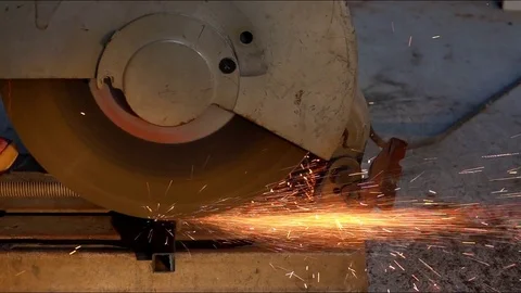 Slow motion cut iron by grinder in steel metal industry Video stock 82735259