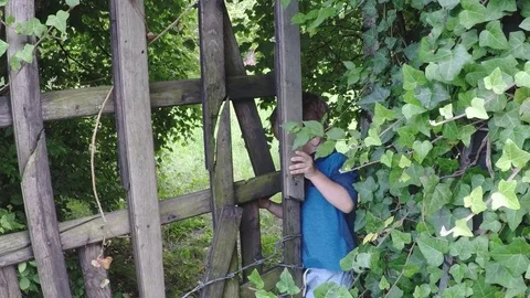 Slow motion, cute boy in magical garden, running Stock-Footage 82193783
