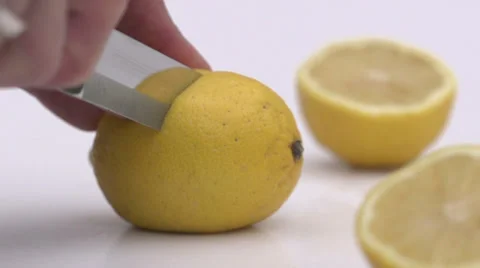 Slow motion cutting lemon Stock Footage 33801789