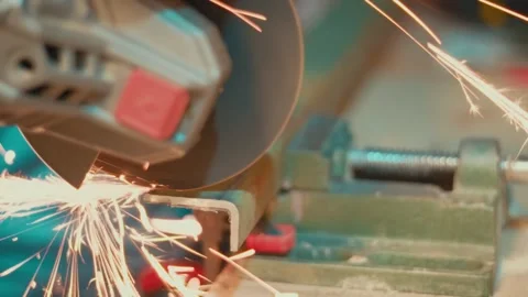 Slow motion cutting metal with angle grinder and sparks Stock Footage 347814699