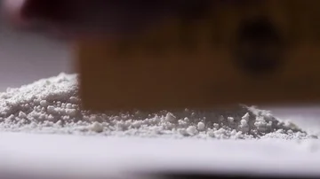 Slow motion cutting white powder Stock Footage 85578672