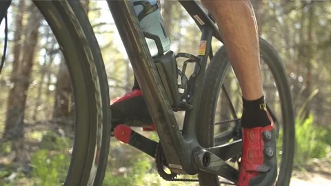 Slow Motion Cyclist Riding On Trail 스톡 동영상 105886071