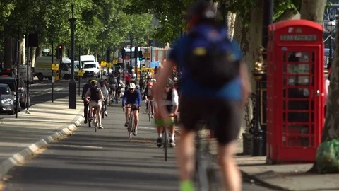 Slow motion cyclists on a London cycle superhighway Stock Footage 101968563