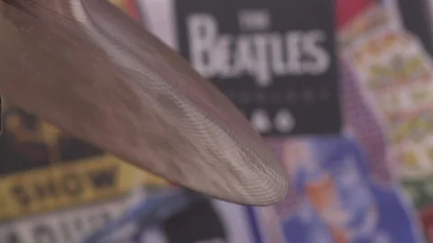 Slow motion of a cymbal getting hit by a drumstick Stock Footage 231469773