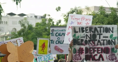 Slow motion of DACA supporters at the march from Echo Park Lake to Olvera in Stock Footage 81575463