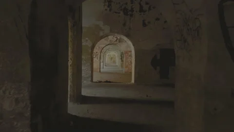 Slow motion dark, desolated corridor with graffiti covered walls. Labyrinth. An Stock Footage 155338246
