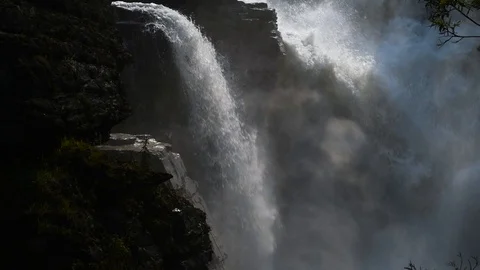 Slow motion dark waterfall misting Stock Footage 95508961