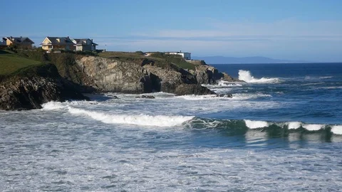 Slow motion of deep blue and teal breaking waves of atlantic ocean Video stock 127777567