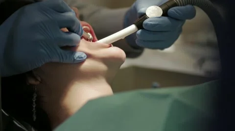 Slow motion dentist working on teeth Stock Footage 40273501