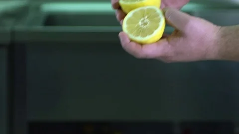 Slow motion detail of a cut half Lemon Stock Footage 71591441