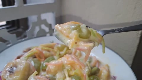 Slow Motion Detail of Mixed Fruit Falling into Rich Custard Stock Footage 315558893