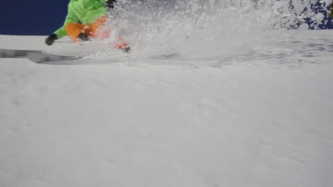 Slow motion detail one carving skiing swing snow splashing Stock Footage 103997780