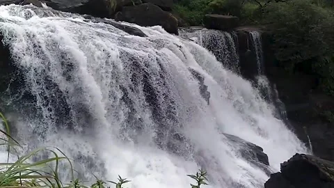Slow motion detail video of one of the small cascade of Mallalli waterfalls Stock Footage 134251553
