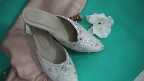 Slow Motion Detailed Shot of Pair of Wedding Rings with Bridal Essentials Stock Footage 341980823