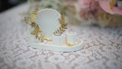 Slow Motion Detailed Shot of Pair of Wedding Rings with Bridal Essentials Stock Footage 342083650