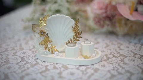 Slow Motion Detailed Shot of Pair of Wedding Rings with Bridal Essentials Stock Footage 342085613