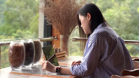 Slow motion digital nomad concept asian freelancer woman use laptop Stock Footage 255365332