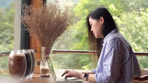 Slow motion digital nomad concept asian freelancer woman use laptop Stock Footage 255365333