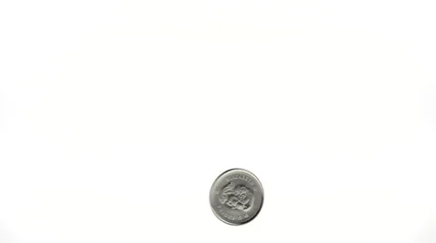 Slow Motion Dime Spinning on a White Background Stock Footage 54295440