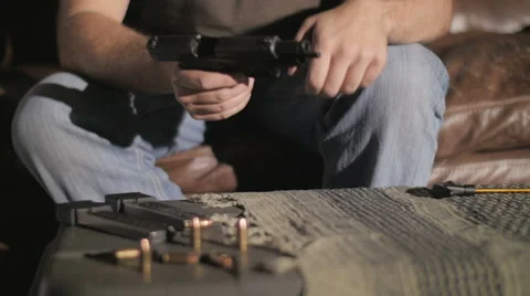 Slow Motion Disassembling a .45 Caliber Semi-Automatic Gun Stock Footage 60664762