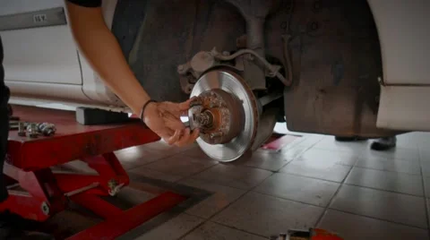 Slow motion disc brake replacement Stock Footage 49133957