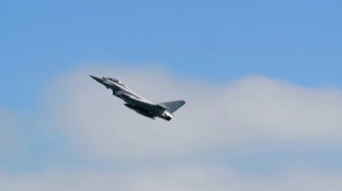 Slow motion display of a multi-role fighter combat aircraft at an air show Stock Footage 68580376
