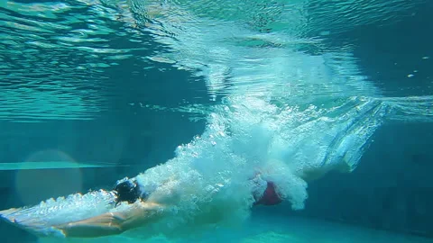 Slow Motion Dive into a Swimming Pool Video stock 160584006
