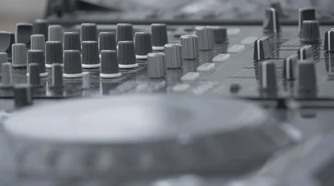 Slow motion dj plays with the cd disc recorder at a party at summer Stock Footage 54218537