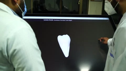 Slow motion of doctors teaching human teeth on vertual screen 2 Stock Footage 199272081