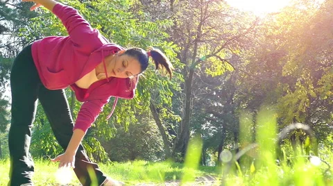 Slow Motion of Doing Exercise In the Nature Stock Footage 56428186