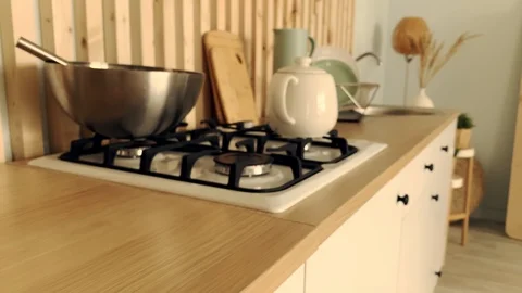 Slow motion. Dolly shot. Close-up view of modern kitchen. 動画素材 125928856