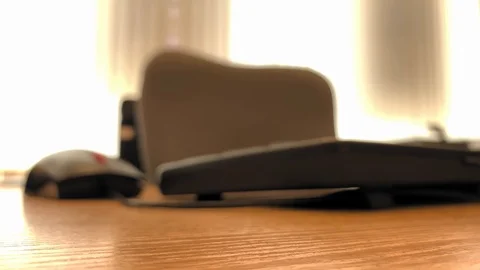 Slow motion. Dolly shot. Sunlight in a beautiful office. Empty office chair Stock Footage 125626550